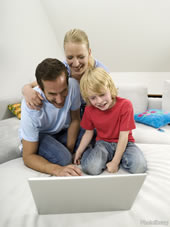 family using laptop